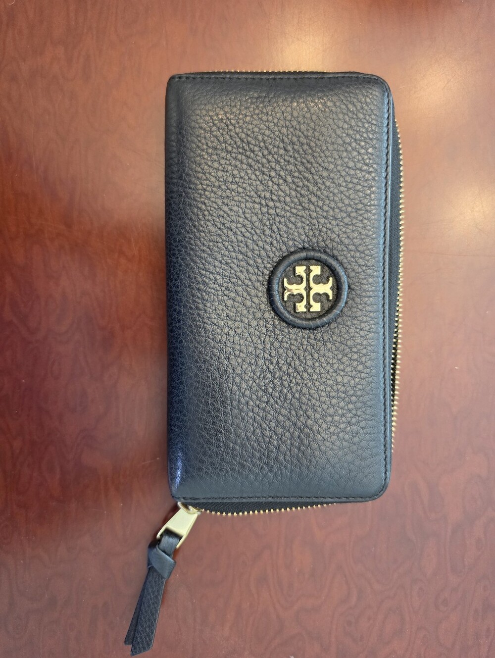 Tory Burch Black Leather Zip-Around Wallet.
